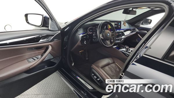 BMW 5 Series 2023, фото 10