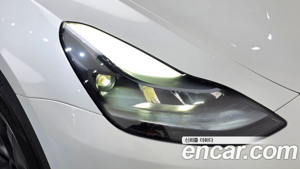 Tesla Model Y 2024, фото 8