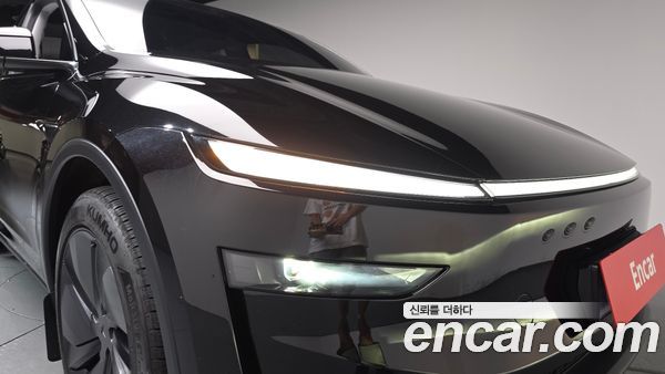 Tesla Model Y 2025, фото 7