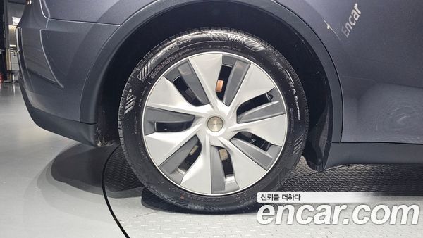 Tesla Model Y 2024, фото 4
