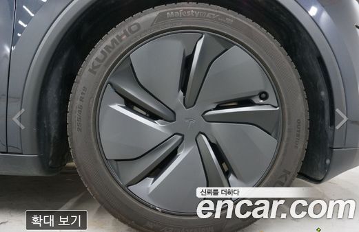 Tesla Model Y 2025, фото 9