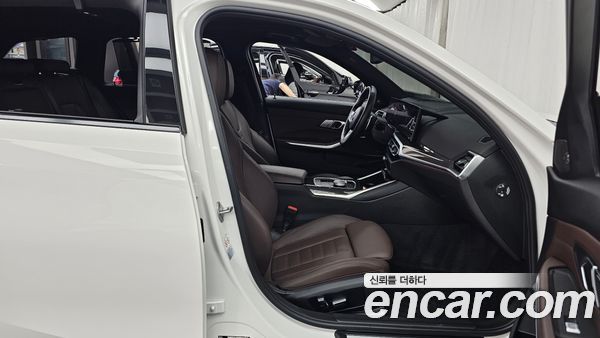 BMW 3 Series 2023, фото 16