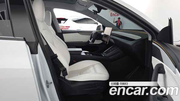 Tesla Model Y 2025, фото 16