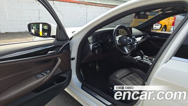 BMW 5 Series 2023, фото 10