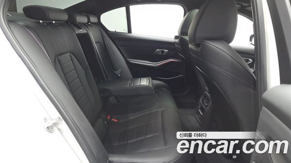 BMW 3 Series 2025, фото 12