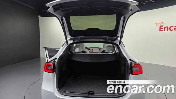 Tesla Model Y 2023, фото 31