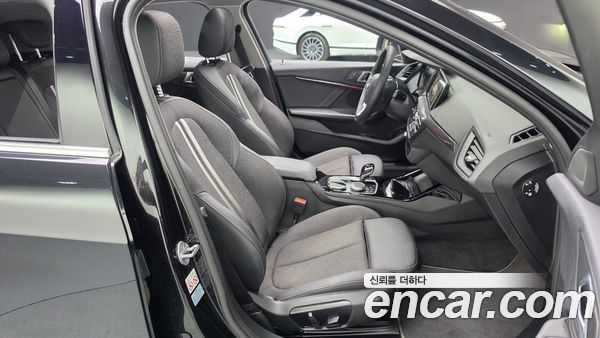 BMW 1 Series 2024, фото 16