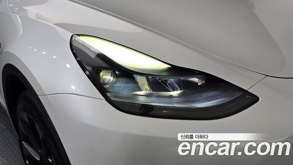 Tesla Model Y 2024, фото 7