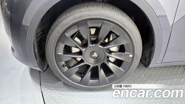 Tesla Model Y 2024, фото 5