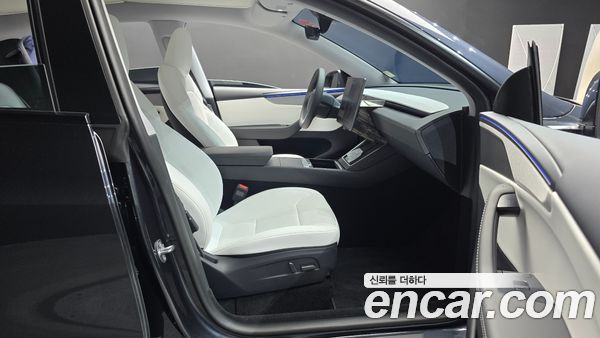 Tesla Model Y 2025, фото 16