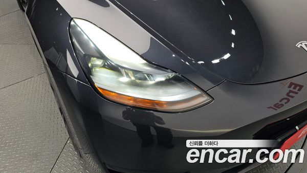 Tesla Model Y 2025, фото 7