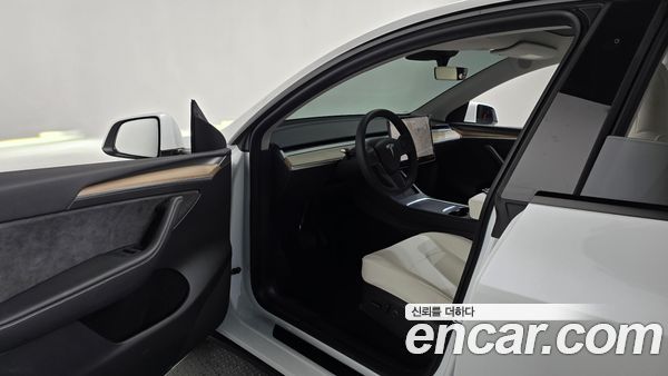 Tesla Model Y 2024, фото 12