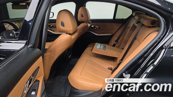 BMW 3 Series 2024, фото 12