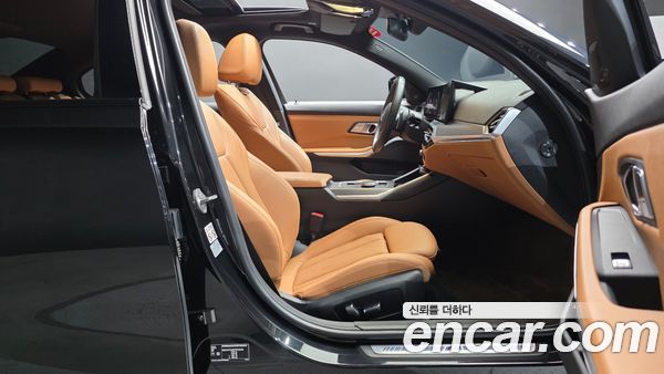 BMW 3 Series 2023, фото 16