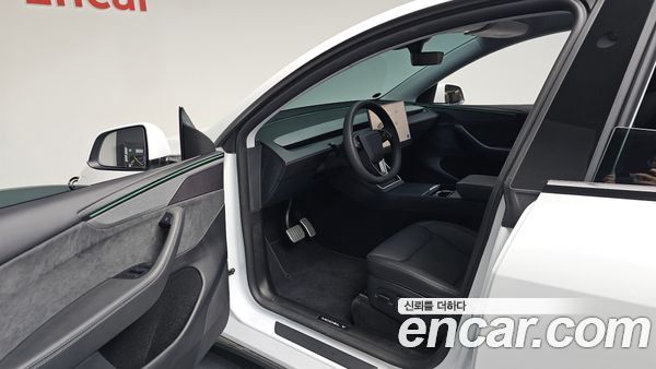 Tesla Model Y 2025, фото 12