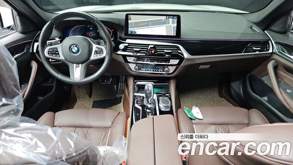 BMW 5 Series 2023, фото 10