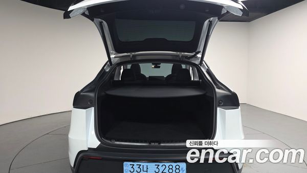 Tesla Model Y 2025, фото 25