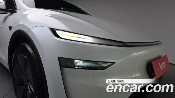 Tesla Model Y 2025, фото 7