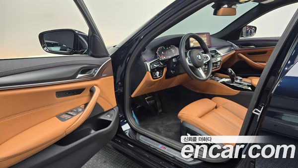 BMW 5 Series 2023, фото 12