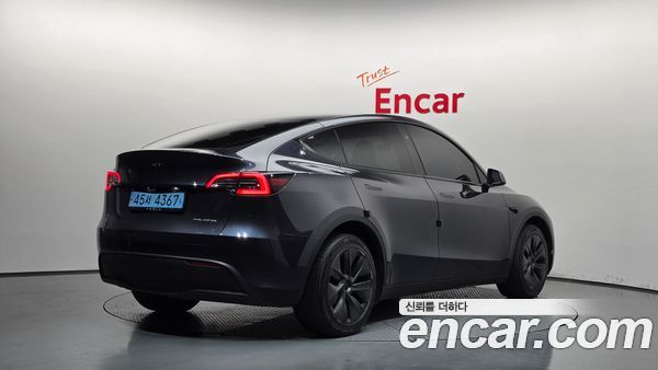 Tesla Model Y 2024, фото 2