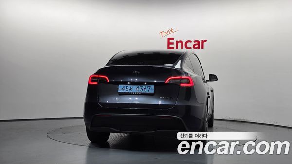 Tesla Model Y 2024, фото 4