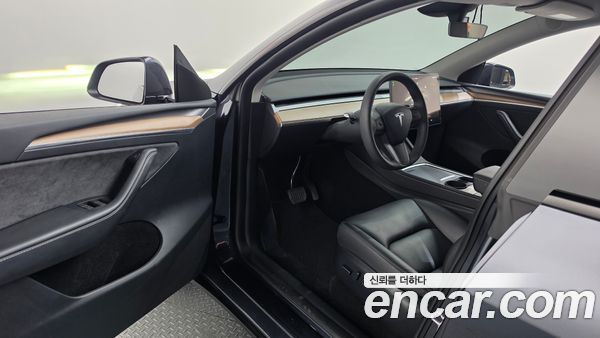 Tesla Model Y 2024, фото 13