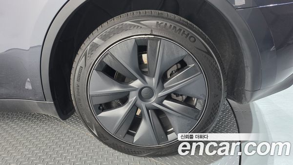 Tesla Model Y 2024, фото 7