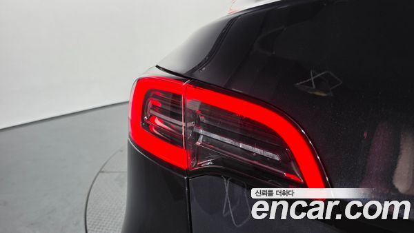Tesla Model Y 2024, фото 9