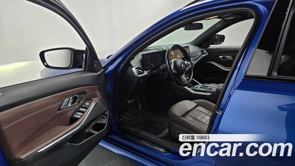 BMW 3 Series 2023, фото 12