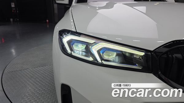 BMW 3 Series 2024, фото 8