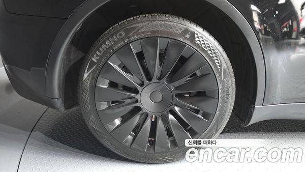 Tesla Model Y 2024, фото 5