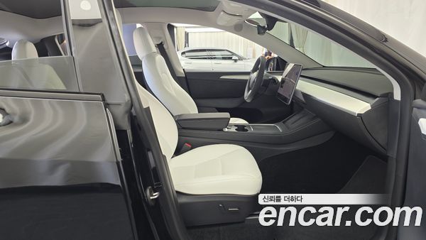 Tesla Model Y 2024, фото 16