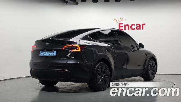 Tesla Model Y 2024, фото 2