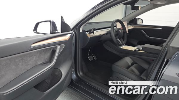 Tesla Model Y 2024, фото 13