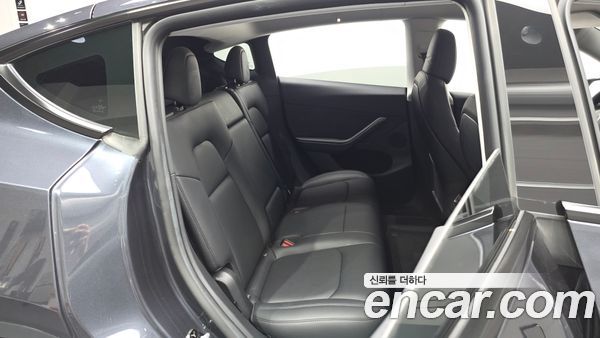 Tesla Model Y 2024, фото 17