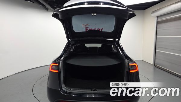 Tesla Model Y 2024, фото 26