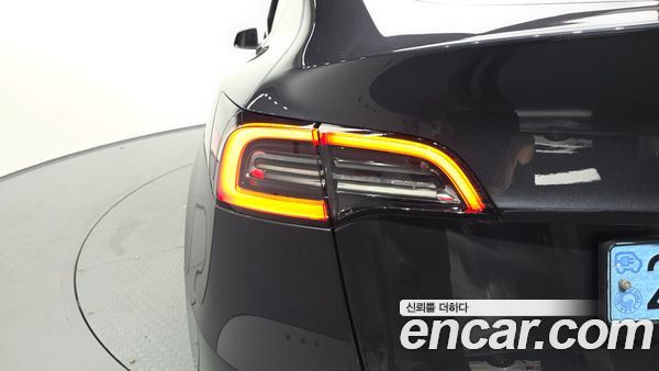 Tesla Model Y 2024, фото 9
