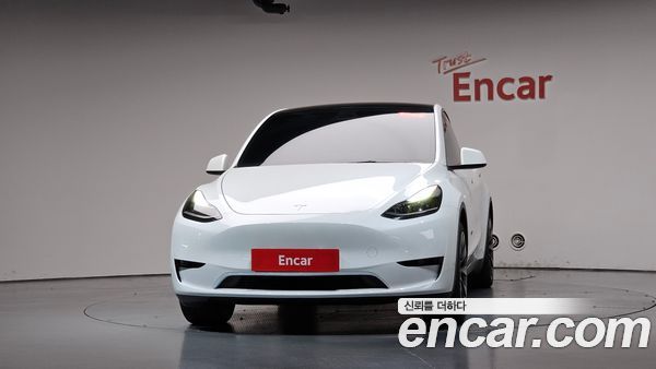 Tesla Model Y 2024, фото 2