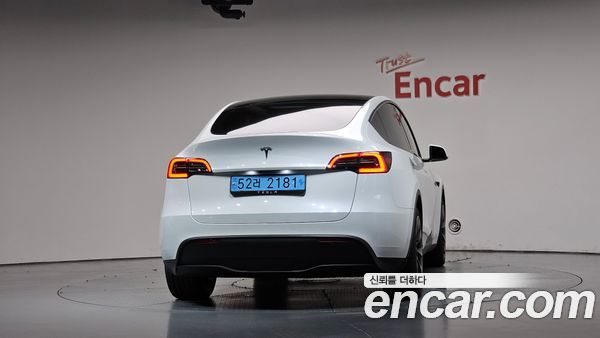 Tesla Model Y 2024, фото 3