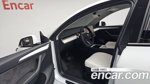 Tesla Model Y 2024, фото 12