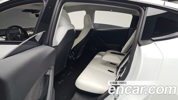 Tesla Model Y 2024, фото 16