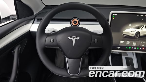 Tesla Model Y 2024, фото 17