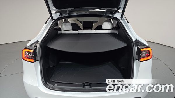 Tesla Model Y 2024, фото 25