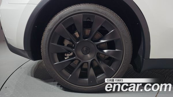 Tesla Model Y 2024, фото 6