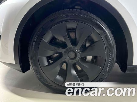 Tesla Model Y 2024, фото 7