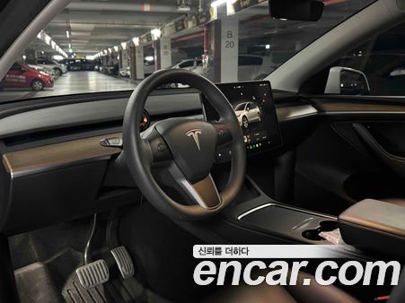 Tesla Model Y 2024, фото 10