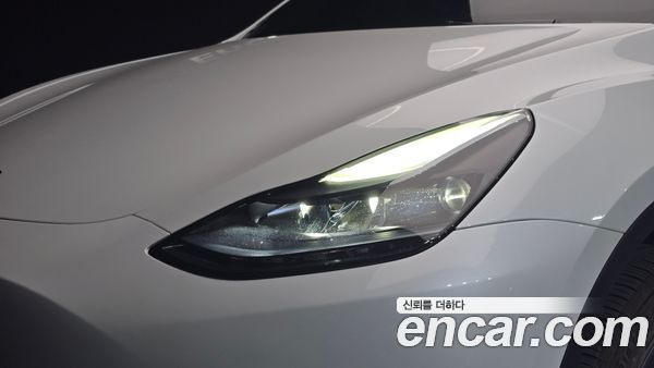 Tesla Model Y 2024, фото 8