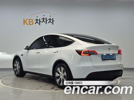 Tesla Model Y 2024, фото 2