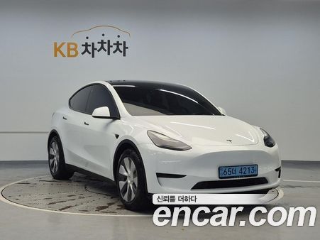 Tesla Model Y 2024, фото 4