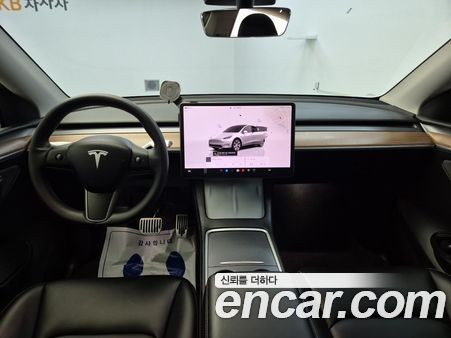 Tesla Model Y 2024, фото 7